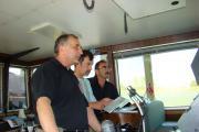 Captain_Argus_with_pilot_Romania_assisting_sail_throughSulina_arm_after_sleepless_night2.jpg