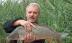 Romanian National Fish Team leader Stefan Tolos presents a good-sized carp (Cyprinus carpio)
